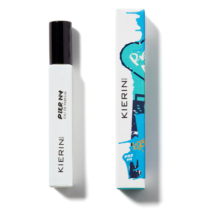 KIERIN Pier New York 10 ml travel spray beside its turquoise graffiti art box.