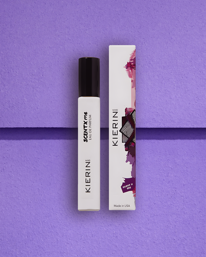 KIERIN ScentXme travel spray and box on a purple background.