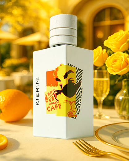 KIERIN Sunday Brunch perfume on a table with yellow roses and citrus fruit.